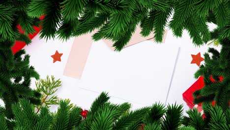 animation of christmas fir tree frame over card and envelope with copy space on white background