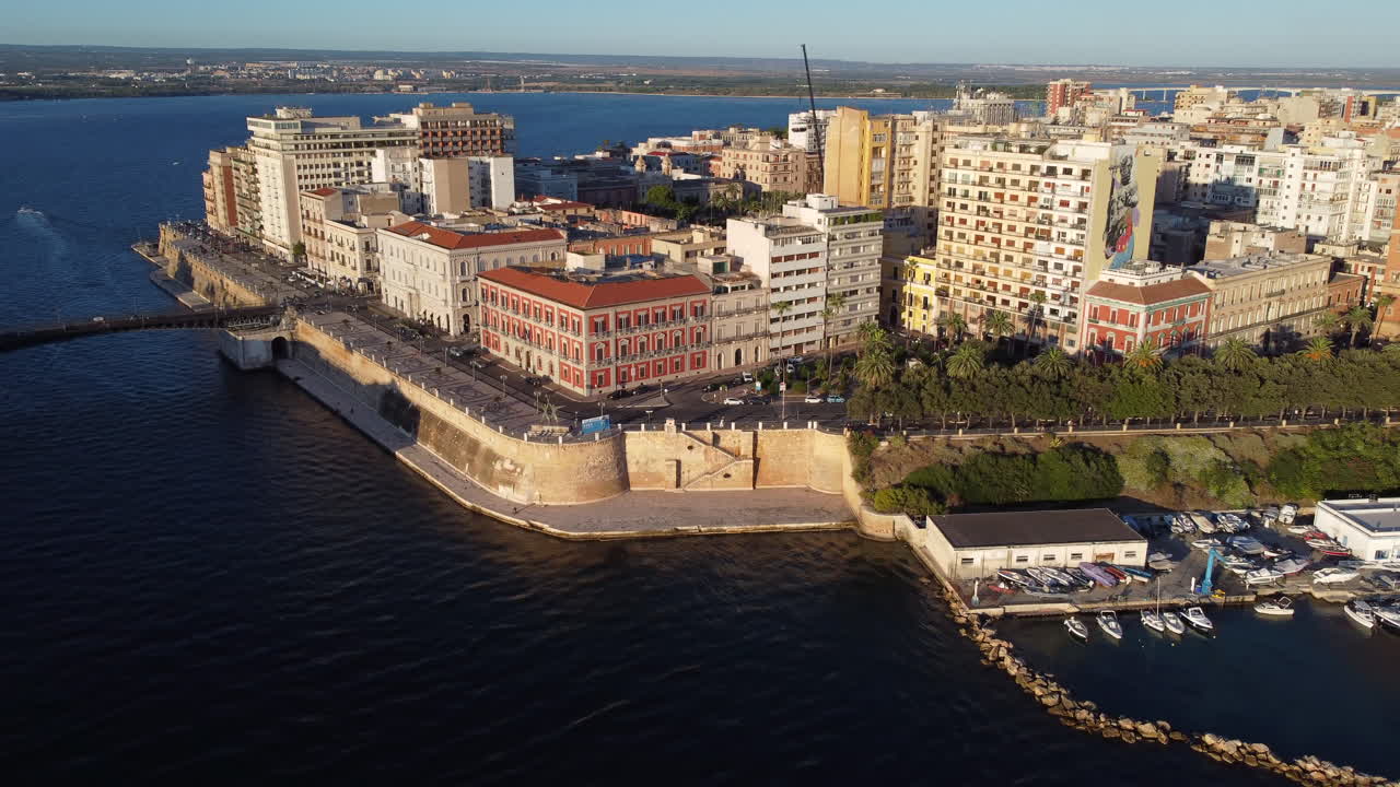 Aerial Pullback Revealing Seaside Taranto City and Mare Piccolo, Italy