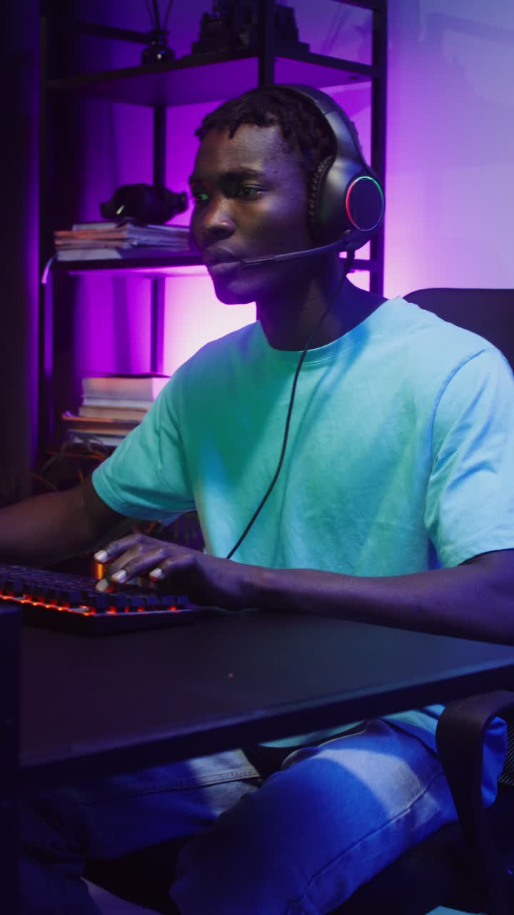 Man playing video game with headset