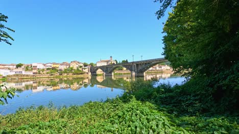 lush greenery frames a tranquil river scene