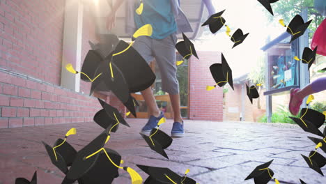 multiple graduation hat icons falling against group of kids running in school corridor