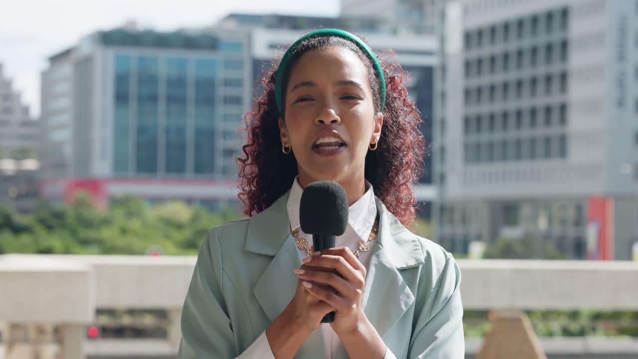 Female reporter doing a live broadcast in the city