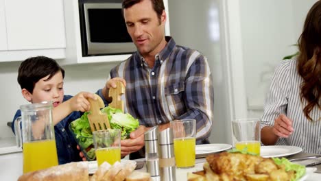 family having healthy meal together at home