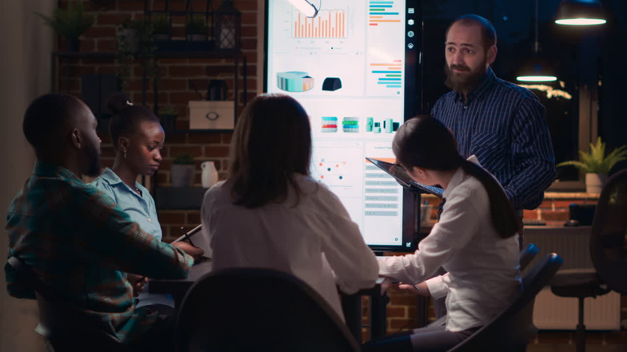 Man presenting company revenue report, comparing data
