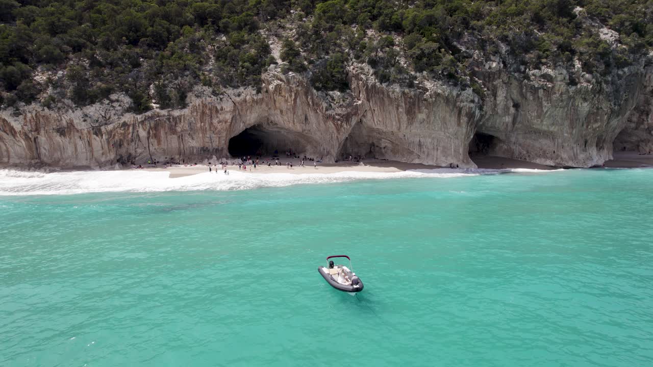Scenic Beach with Caves and Turquoise Waters