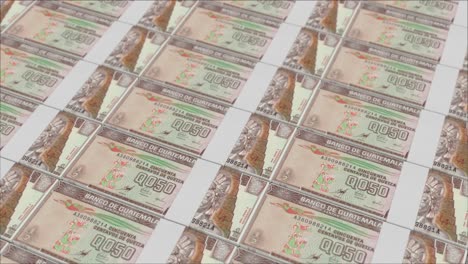 half guatemalan quetzal banknotes printed by a money press