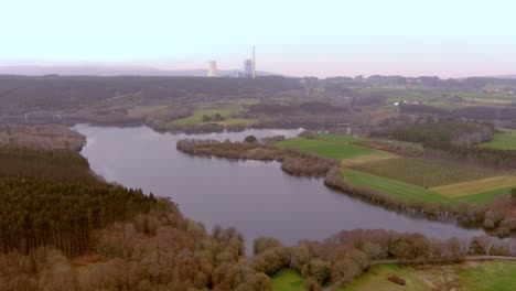 Aerial-Over-Encoro-de-Villasenin-Reservoir-With-Meirama-Thermal-Power-Plant-In-Distance