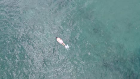 Cenital-shot-of-boy-snorkeling-in-Hawaii