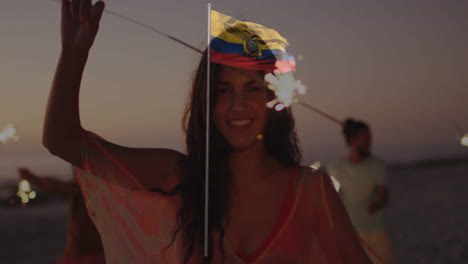 celebrating with sparklers, woman holding ecuador flag animation at sunset beach
