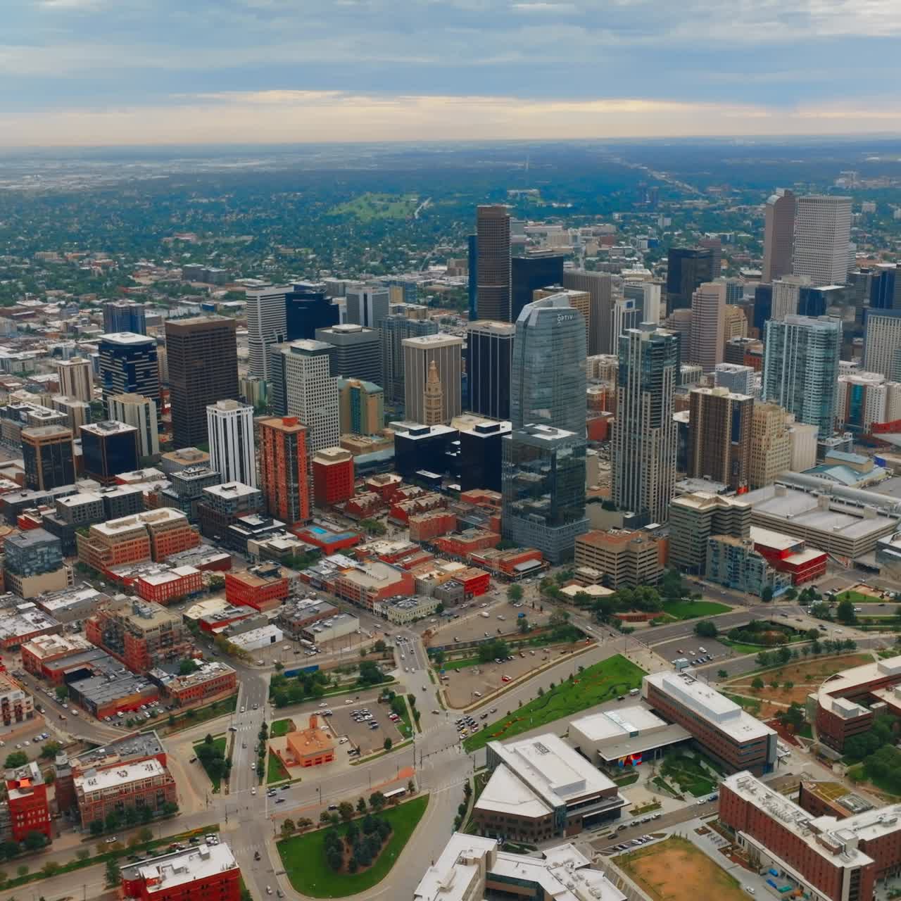 Skyscrapers of Denver, Colorado, United States on gloomy daytime. Densely built urban scenery from aerial perspective