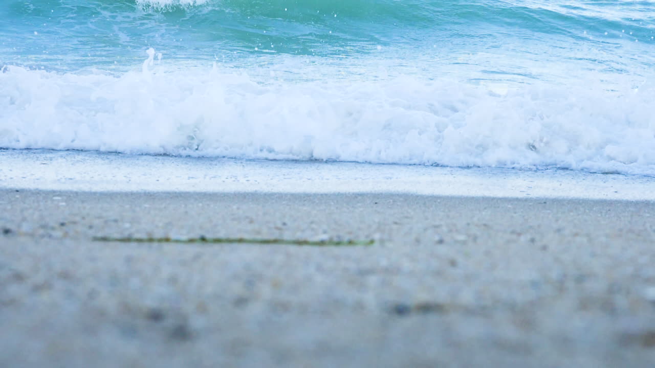 Low angle of waves on the beach