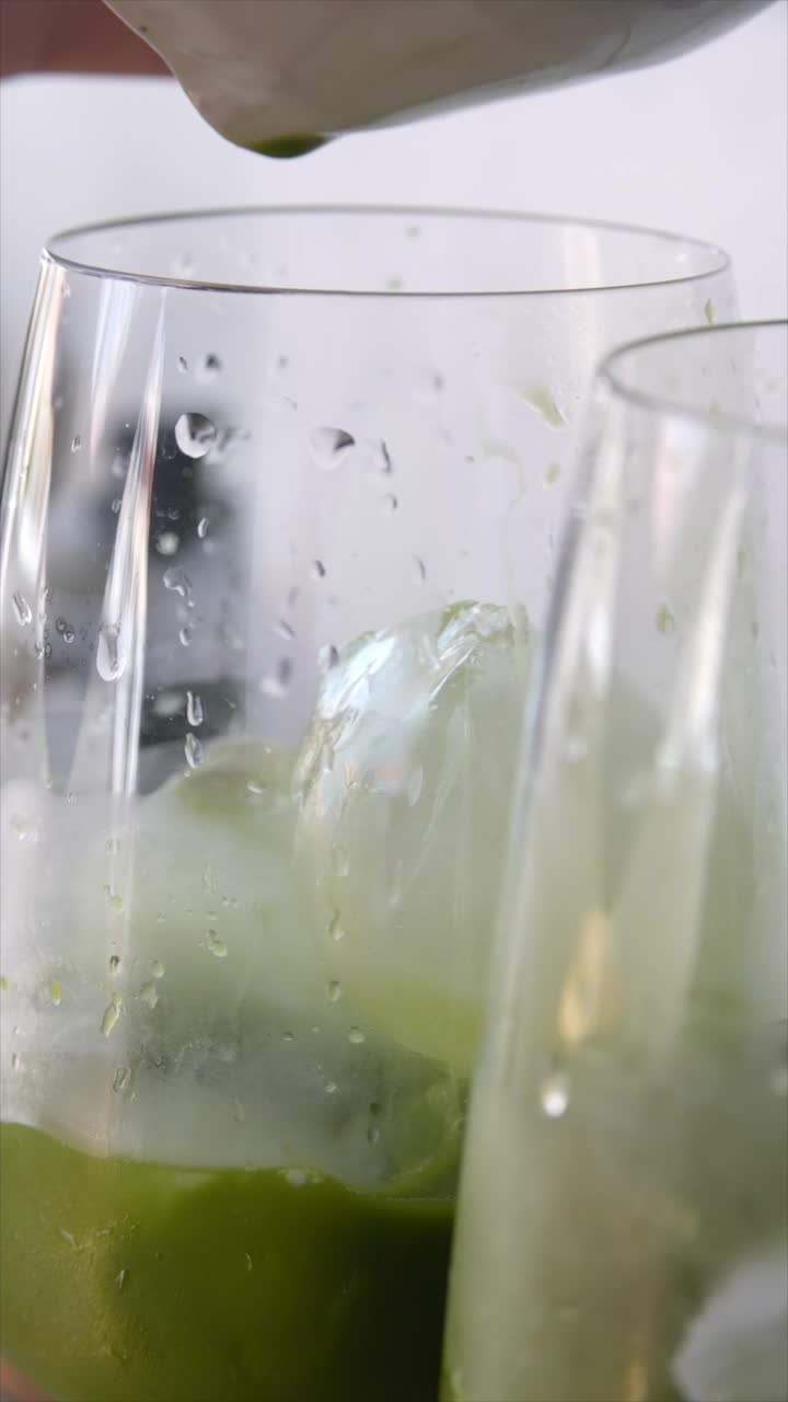 A refreshing glass of iced green drink