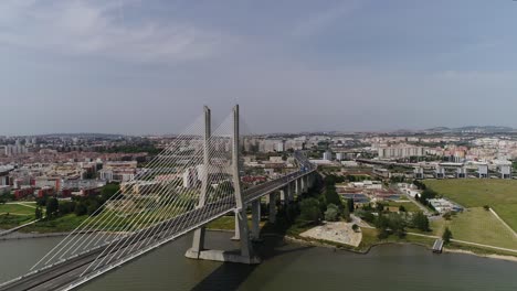 ponte vasco da gama, lisbon, portugal 4k aerial view