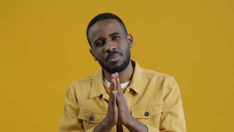 man praying or begging