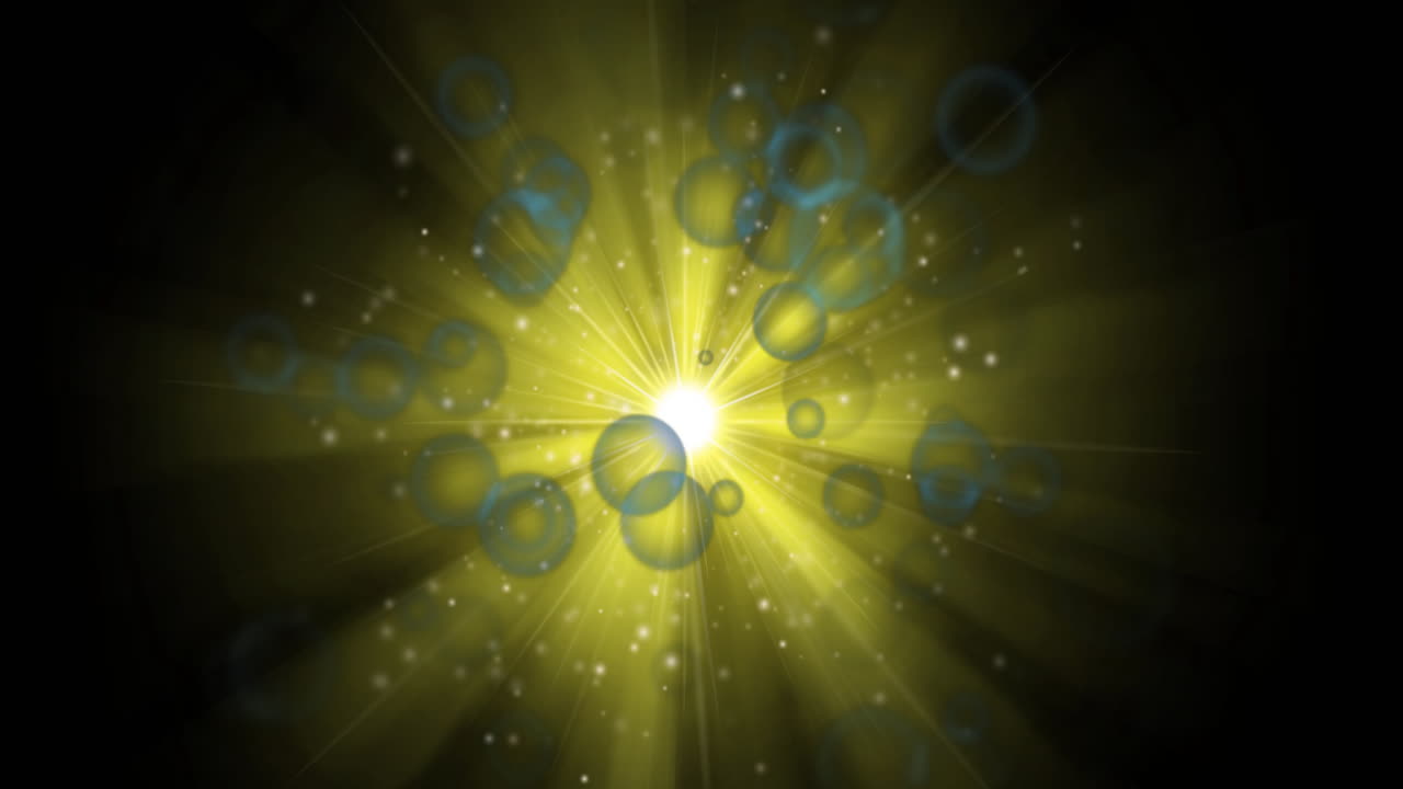 Animation of bubbles and yellow lights on black background