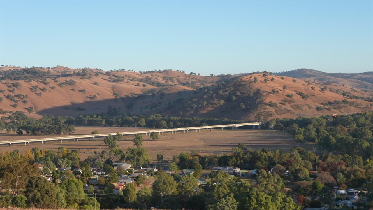 High angle mid-wide shot of the Prince Alfred bridge viaduct crossing the Murrumbidgee valley in Gundagai, New South Wales, Australia