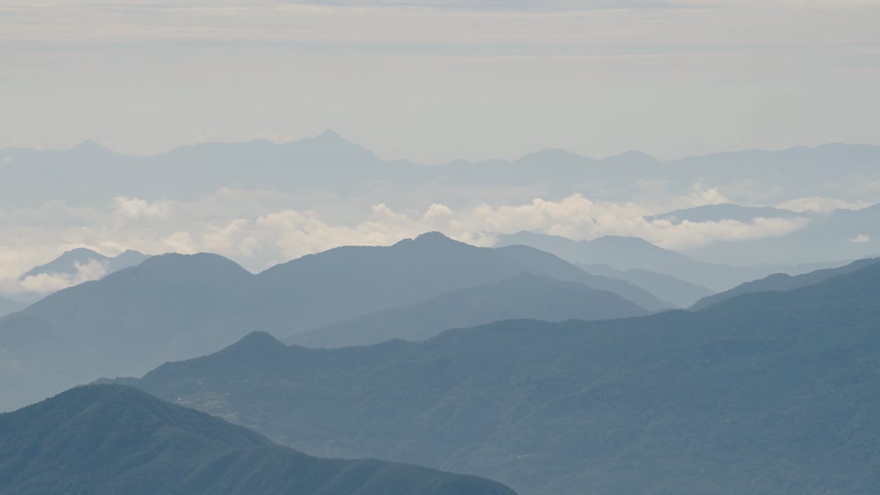 Layers of List Blue Mountain Background with Copy Space, Beautiful Misty Mountains Landscape Scenery with Copyspace, Elevated Aerial View Nature Background in the Himalayas in Nepal