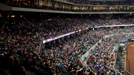 slow motion landscape of baseball stadium field grandstand filled with fans and supporters at major league sports game in park arlington dallas texas usa america