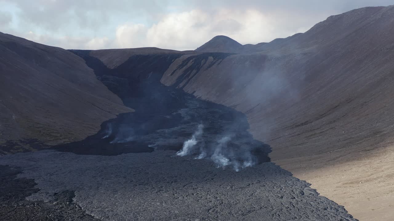 Black earth surface from volcanic basalt rock in Natthagi valley, Iceland