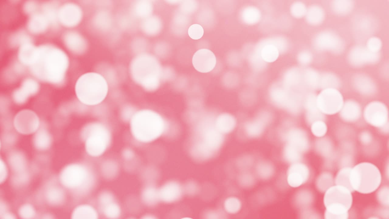 ピンク色のパーティクル。4Kビデオ