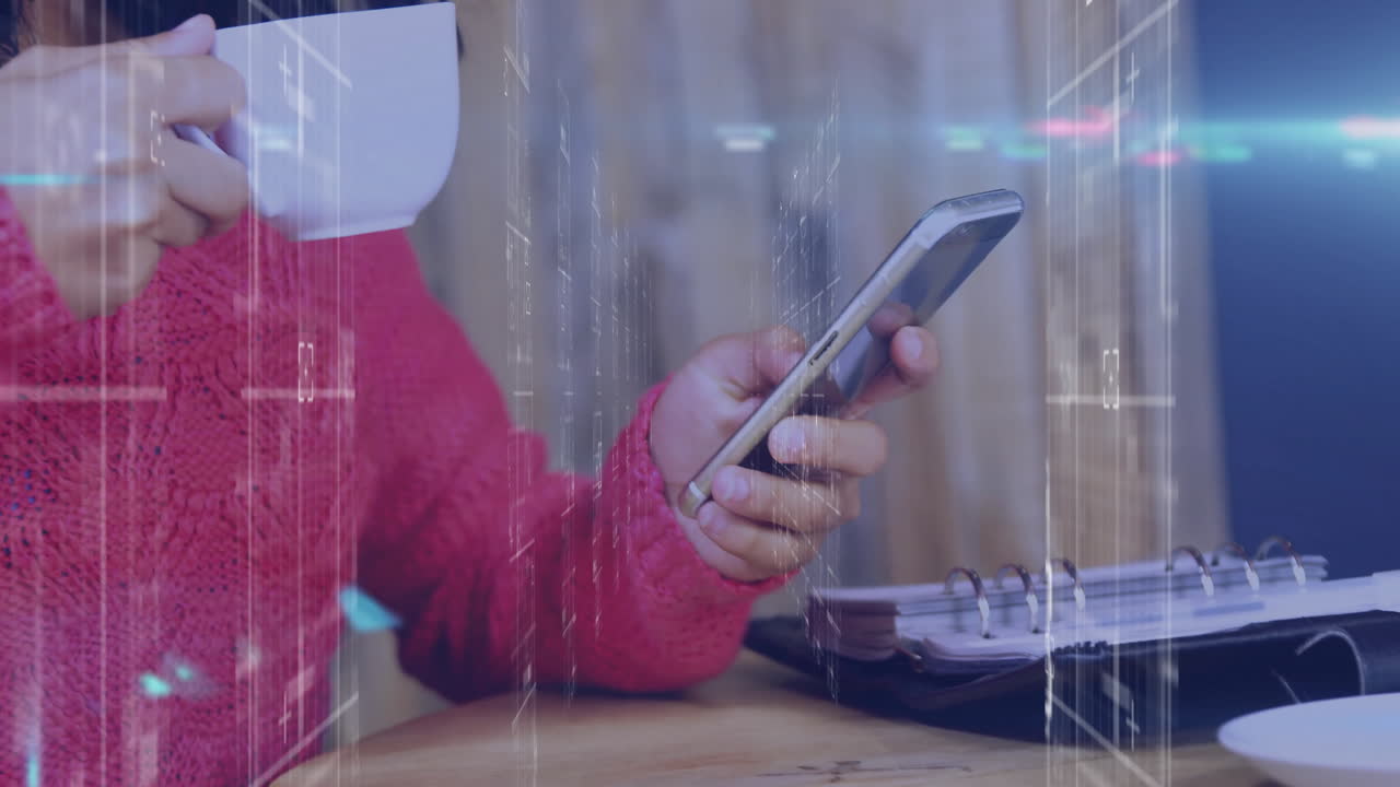 woman holding mug and using smartphone at table with planner, showing animated education icons