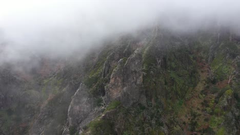 Drone shot moving down over the cliffs of Nuns Valley in Madeira.