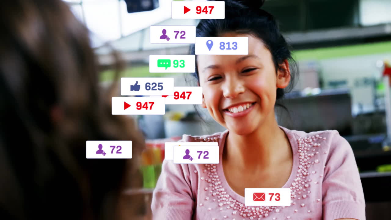 Smiling at phone, woman receiving social media notifications with animation overlay