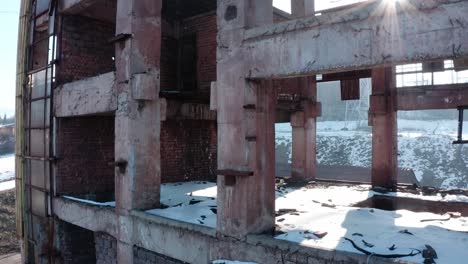 abandoned industrial factory at vlahita with snow, romania