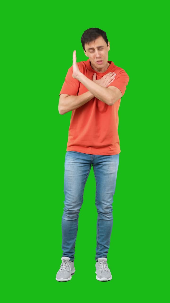 Man in distress with a pained expression and crossed arms