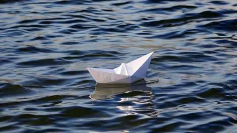 paper boat on water