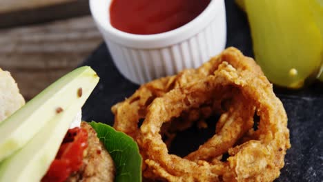 Snacks-and-ketchup-on-wooden-table