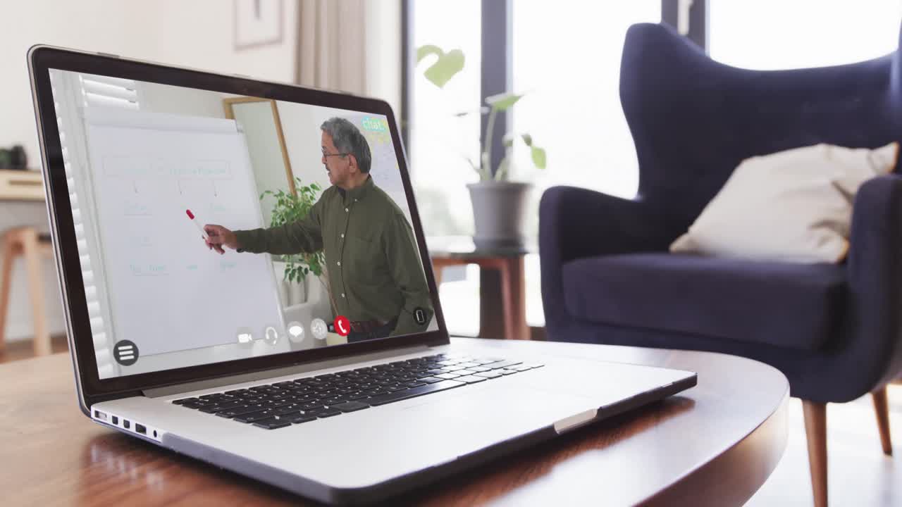 Composition of laptop online learning with biracial male teacher on screen