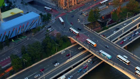 Traffic-At-Pacific-Motorway-With-Buses-Driving-From-Victori-a-Bridge-In-Brisbane,-QLD,-Australia