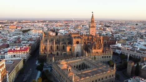 catedral de sevilla. drone shot of the beautiful spanish city of seville at the sunrise, uhd, 4k