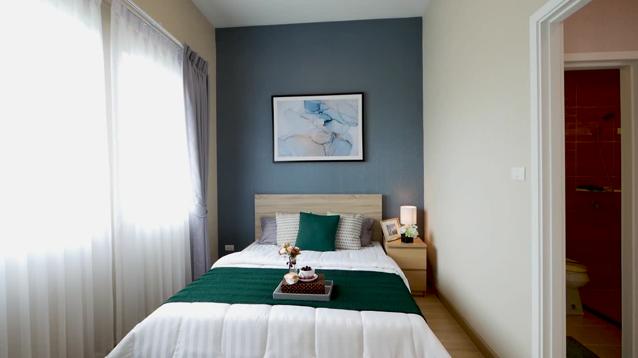 decoración de dormitorio elegante y cómoda con iluminación natural