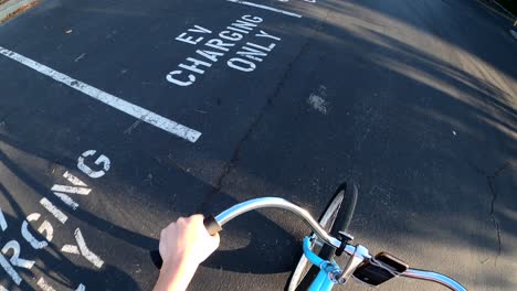 empty electric vehicle charging stations in the heart of silicon valley's tech company parking lots