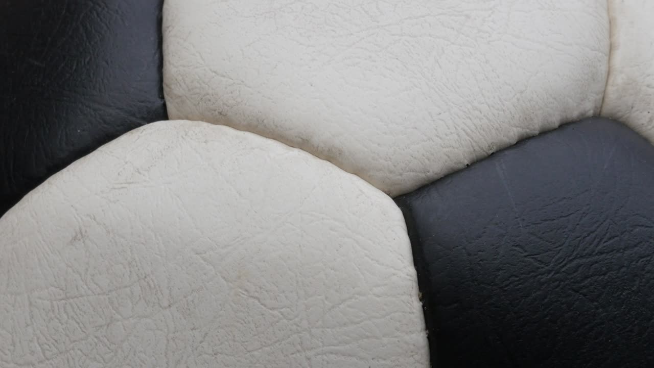Close-up of classic football detailed surface 4K