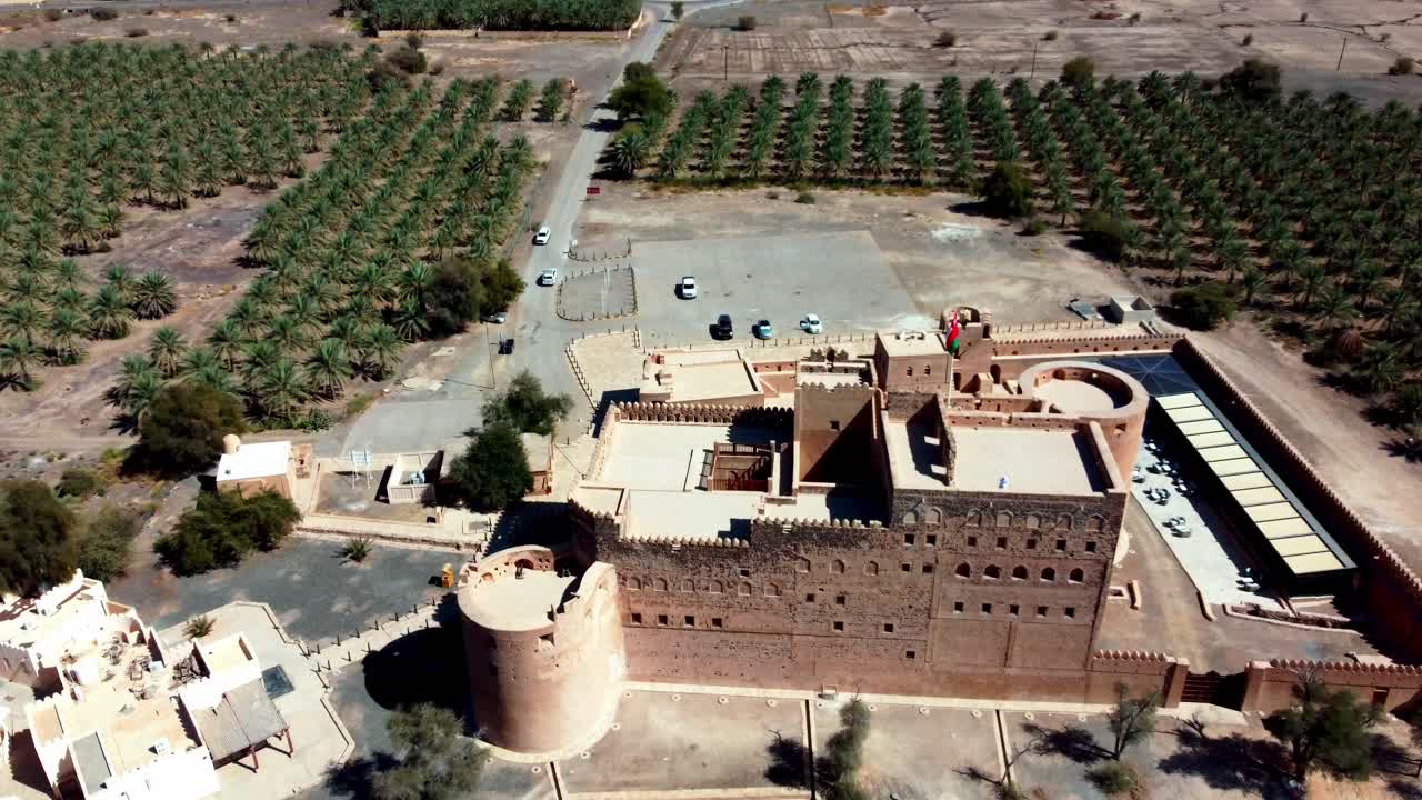 Aerial view of Jabreen Castle, Oman! A majestic 17th-century fortress known for its elegance and history. Watch now!
