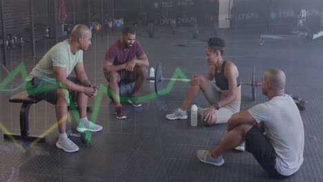 Animation-of-data-processing-on-graph-over-diverse-fitness-group-sitting-talking-at-gym