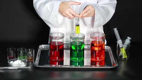 experimento científico con líquidos, jeringa y hielo seco