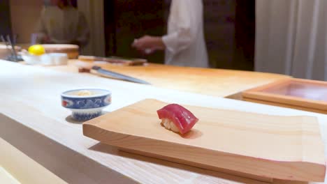 close-up of a tuna nigiri sushi at a japanese restaurant