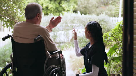 nurse, talking and man in a wheelchair in garden