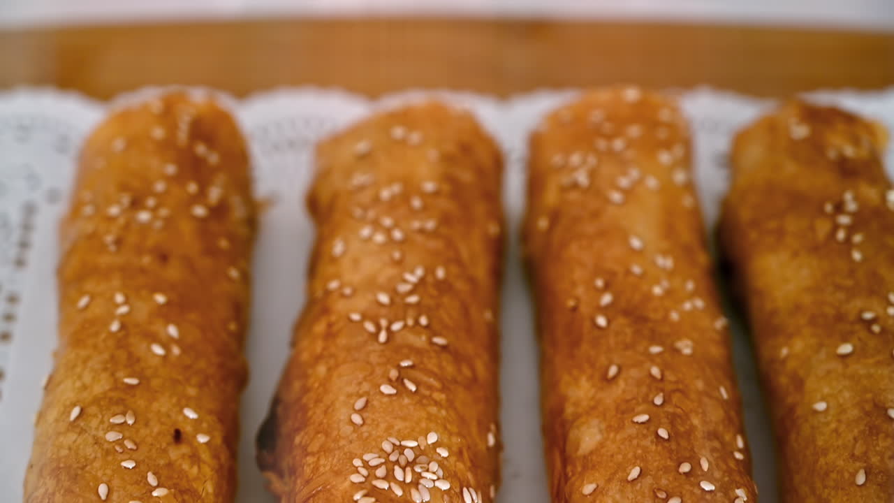 Four ready-made placints with stuffing on a fabric. Slow motion