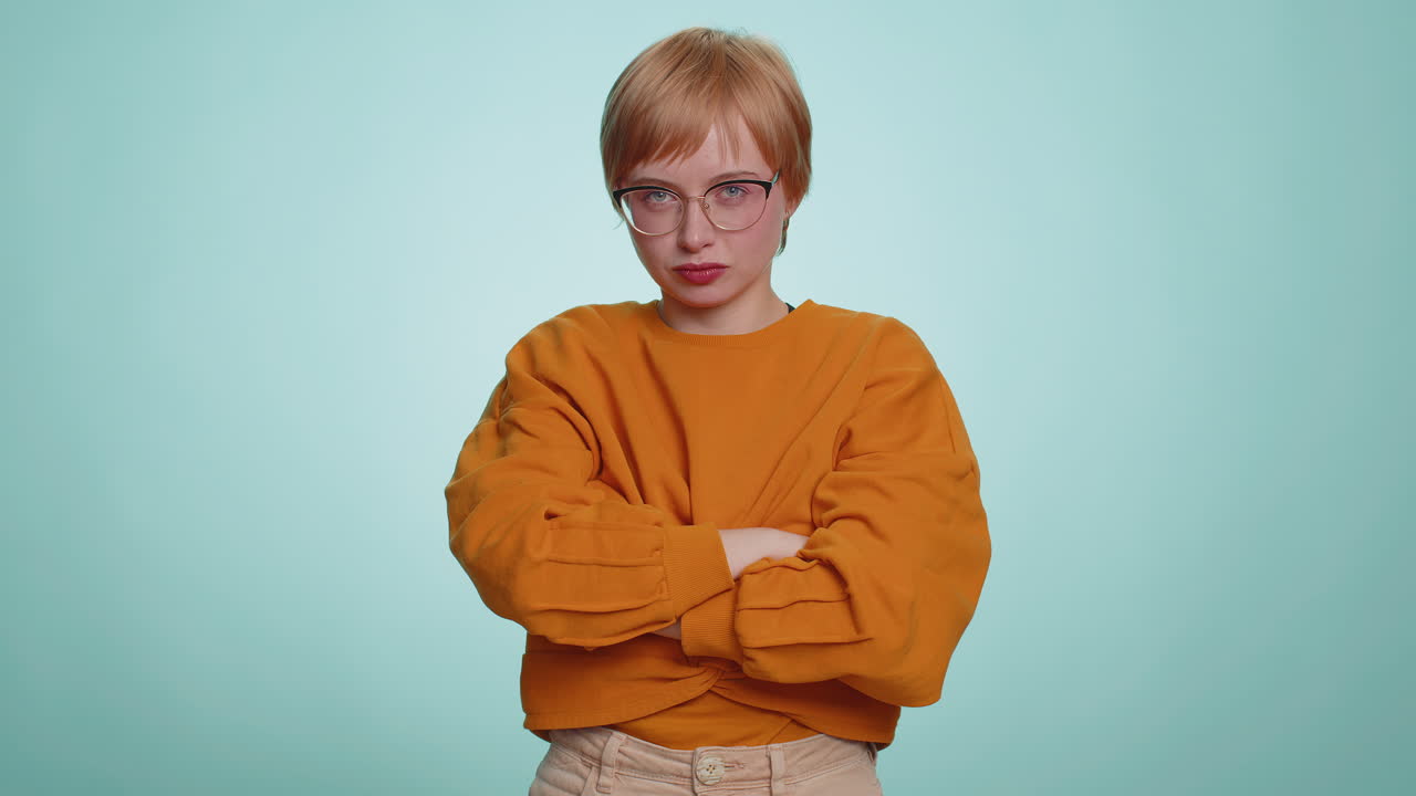 Upset attractive woman girl showing thumbs down sign gesture disapproval dissatisfied dislike