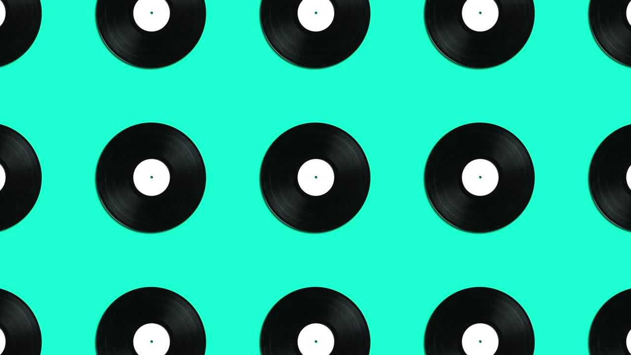 Retro vinyl disks in geometric pattern on a green background. Minimal motion graphics music animation concept