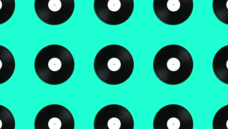 discos de vinilo retro con patrón geométrico sobre un fondo verde. gráficos de movimiento mínimos concepto de animación musical