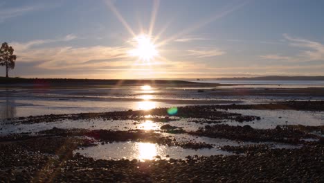 sunset over the coastline