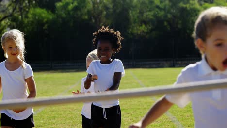 children playing lemon and spoon race