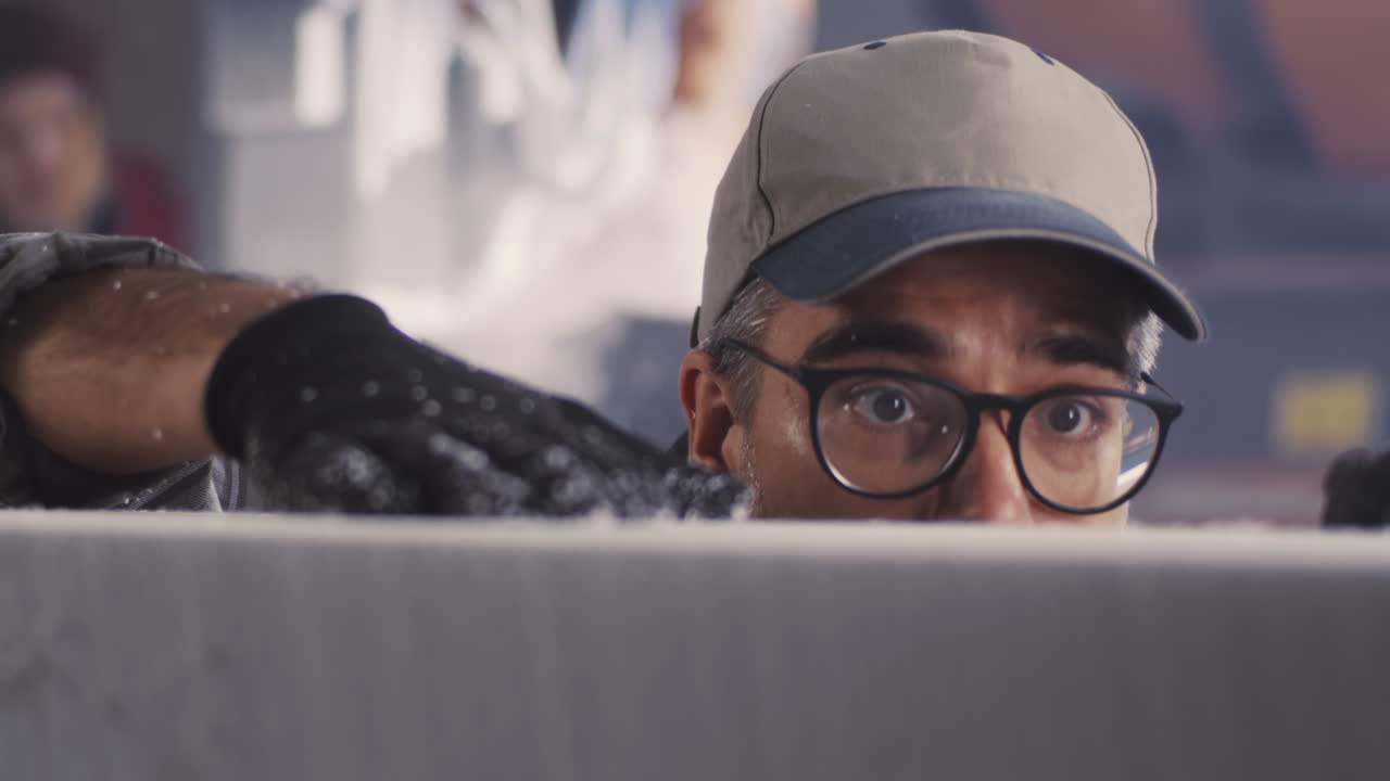 Man Carving Ice Sculpture