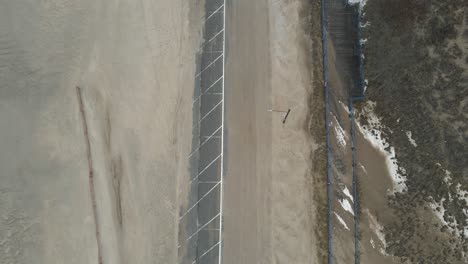 Closed-down-for-the-Winter,-Beach-Street-in-Muskegon-Strewn-with-Sand-and-Snow